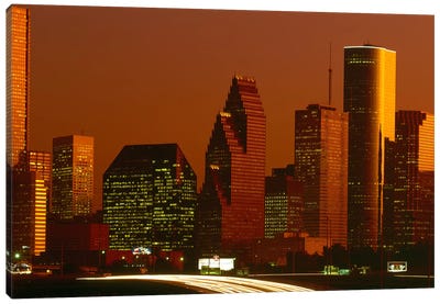 Skyscrapers in a city at sunset, Houston, Texas, USA Canvas Art Print - City Sunrise & Sunset Art