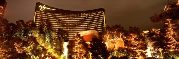 Gambling: Hotel lit up at night, Wynn Las Vegas, The Strip, Las Vegas, Nevada, USA by Panoramic Images