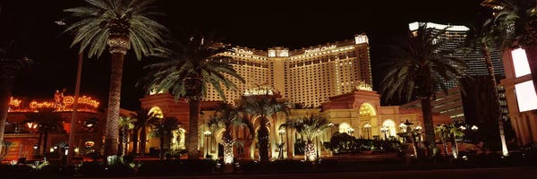 Gambling: Hotel lit up at night, Monte Carlo Resort And Casino, The Strip, Las Vegas, Nevada, USA by Panoramic Images