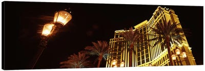 Low angle view of a hotel lit up at night, The Strip, Las Vegas, Nevada, USA Canvas Art Print - Palm Tree Art