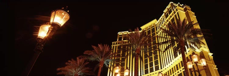 Low angle view of a hotel lit up at night, The Strip, Las Vegas, Nevada, USA