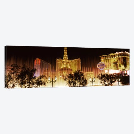 Hotels in a city lit up at night, The Strip, Las Vegas, Nevada, USA Canvas Print #PIM8557} by Panoramic Images Canvas Wall Art