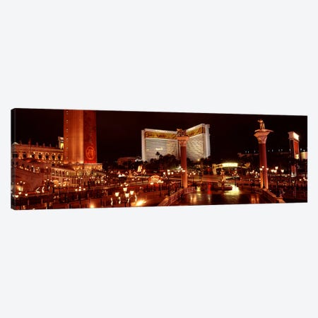 Hotel lit up at night, The Mirage, The Strip, Las Vegas, Nevada, USA Canvas Print #PIM8564} by Panoramic Images Art Print
