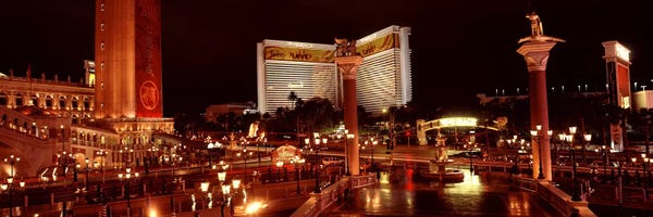 Gambling: Hotel lit up at night, The Mirage, The Strip, Las Vegas, Nevada, USA by Panoramic Images