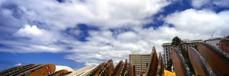 Low angle view of skyscrapers and surfboards, Honolulu, Oahu, Hawaii, USA