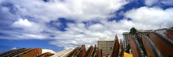 Honolulu: Low angle view of skyscrapers and surfboards, Honolulu, Oahu, Hawaii, USA by Panoramic Images