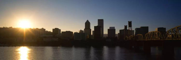 Buildings along the waterfront at sunset, Willamette River, Portland, Oregon, USA