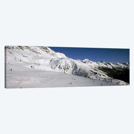 Tourists in a ski resort, Sankt Anton am Arlberg, Tyrol, Austria Canvas Print #PIM8686} by Panoramic Images Canvas Artwork