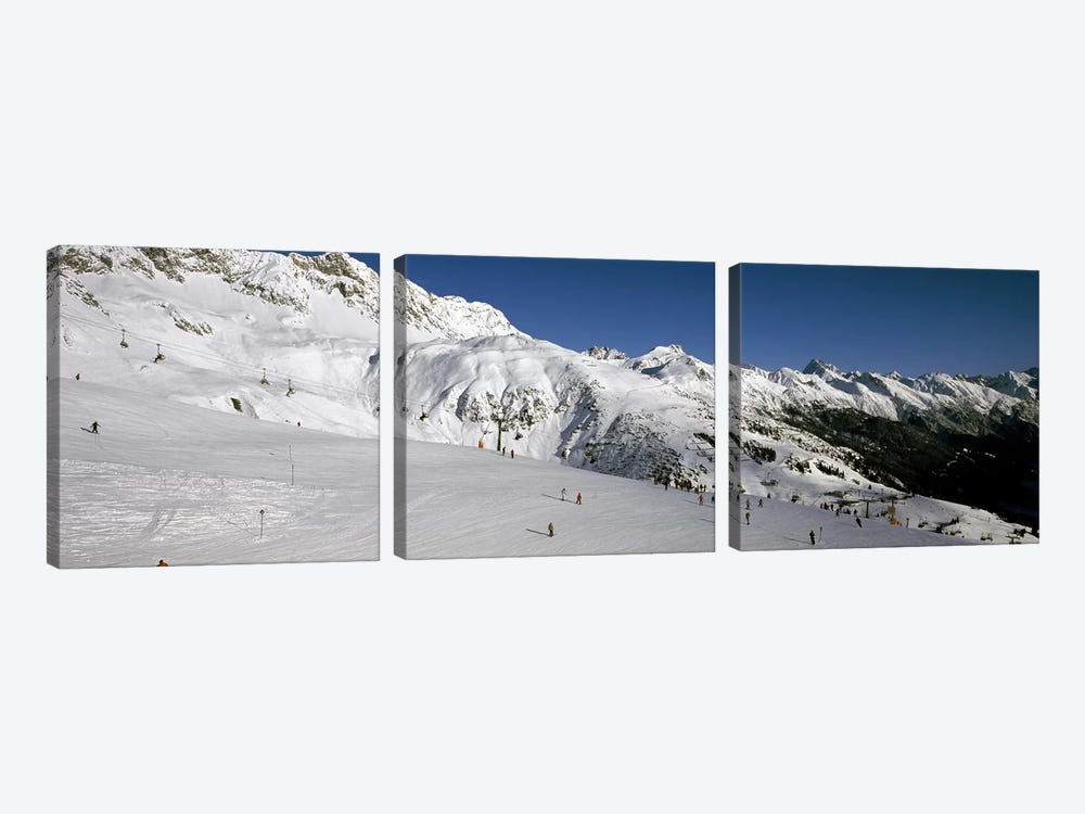 Tourists in a ski resort, Sankt Anton am Arlberg, Tyrol, Austria by Panoramic Images 3-piece Canvas Art Print