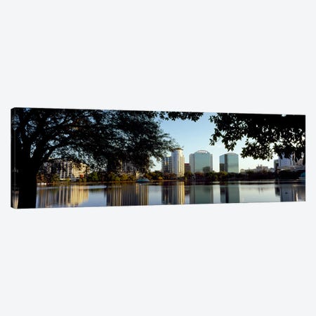Buildings at the waterfront, Lake Eola, Orlando, Orange County, Florida, USA Canvas Print #PIM8691} by Panoramic Images Canvas Artwork