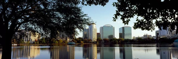 Orlando: Buildings at the waterfront, Lake Eola, Orlando, Orange County, Florida, USA by Panoramic Images