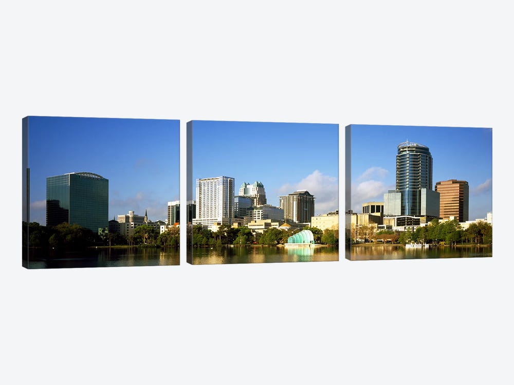 Buildings at the waterfront, Lake Eola, Orlando, Orange County, Florida, USA 2010 by Panoramic Images 3-piece Canvas Print