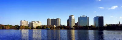 Buildings at the waterfront, Lake Eola, Orlando, Orange County, Florida, USA 2010 #2 by Panoramic Images canvas print