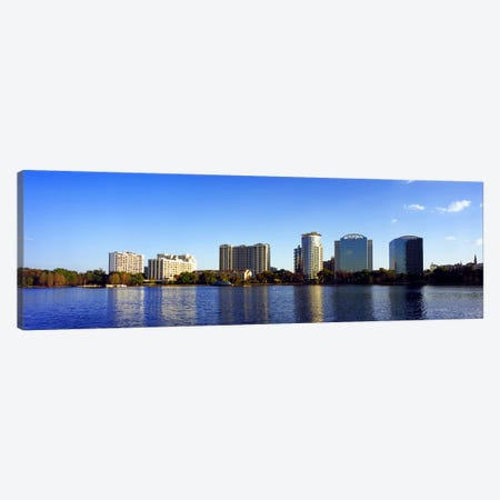 Buildings at the waterfront, Lake Eola, Orlando, Orange County, Florida, USA 2010 #2 Canvas Print #PIM8696} by Panoramic Images Canvas Art Print