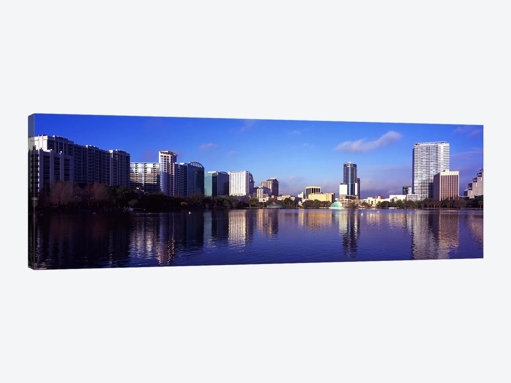 Buildings at the waterfront, Lake Eola, Orlando, Orange County, Florida, USA 2010 #3 by Panoramic Images 1-piece Art Print