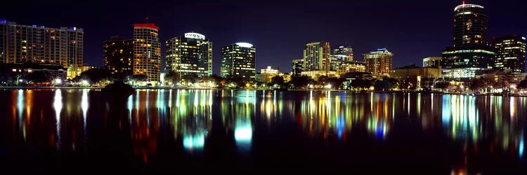 Buildings lit up at night in a city, Lake Eola, Orlando, Orange County, Florida, USA 2010