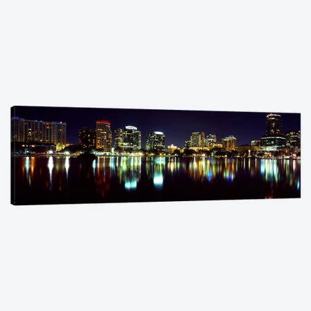 Buildings lit up at night in a city, Lake Eola, Orlando, Orange County, Florida, USA 2010 Canvas Print #PIM8699} by Panoramic Images Canvas Wall Art