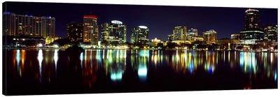 Buildings lit up at night in a city, Lake Eola, Orlando, Orange County, Florida, USA 2010 Canvas Art Print - Orlando Art