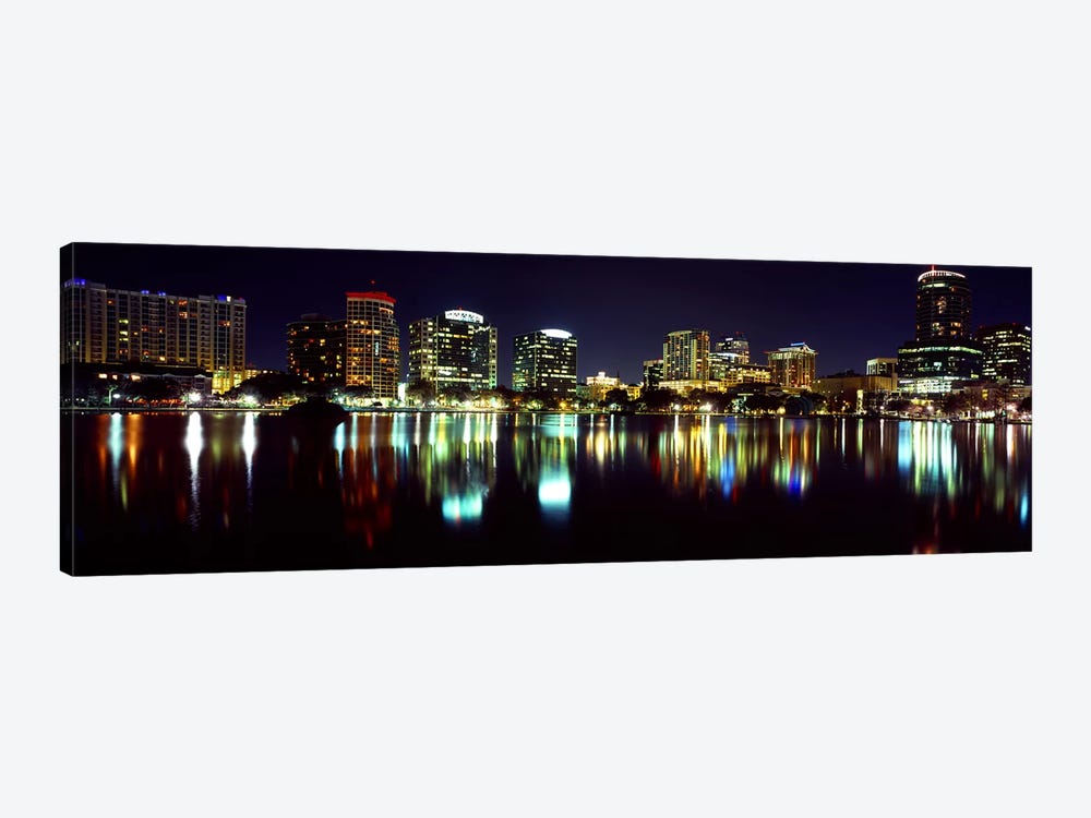 Buildings lit up at night in a city, Lake Eola, Orlando, Orange County, Florida, USA 2010 by Panoramic Images 1-piece Canvas Art Print