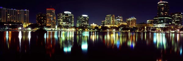 Orlando: Buildings lit up at night in a city, Lake Eola, Orlando, Orange County, Florida, USA 2010 by Panoramic Images