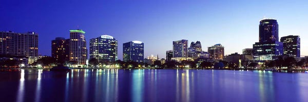 Orlando: Buildings lit up at night in a city, Lake Eola, Orlando, Orange County, Florida, USA 2010 #2 by Panoramic Images
