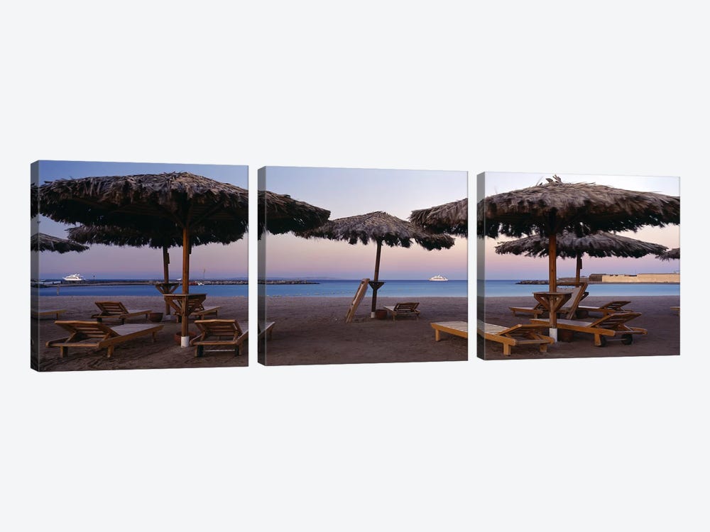Lounge chairs with sunshades on the beach, Hilton Resort, Hurghada, Egypt by Panoramic Images 3-piece Art Print