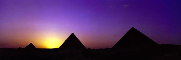 Silhouette of pyramids at dusk, Giza, Egypt