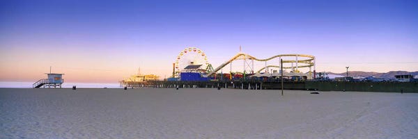 Amusement Parks: Ferris wheel lit up at duskSanta Monica Beach, Santa Monica Pier, Santa Monica, Los Angeles County, California, USA by Panoramic Images