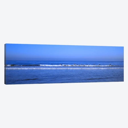 Surfers riding a wave in the sea, Santa Monica, Los Angeles County, California, USA Canvas Print #PIM8759} by Panoramic Images Canvas Print