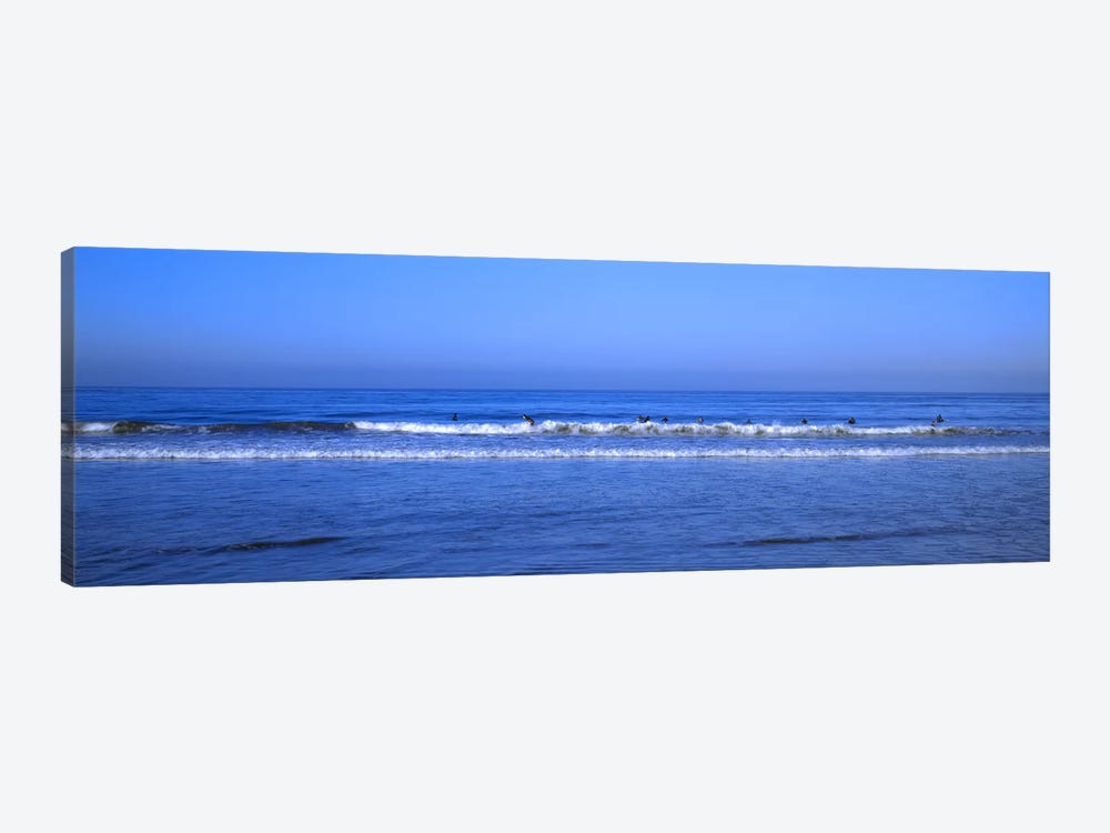 Surfers riding a wave in the sea, Santa Monica, Los Angeles County, California, USA by Panoramic Images 1-piece Canvas Art