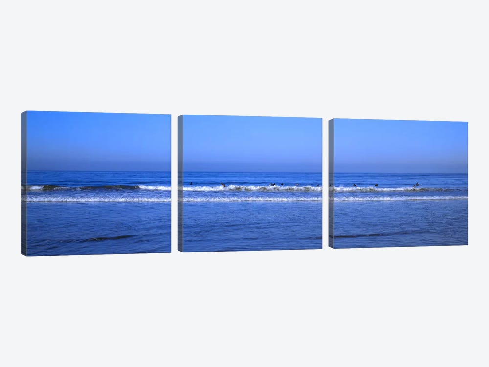 Surfers riding a wave in the sea, Santa Monica, Los Angeles County, California, USA by Panoramic Images 3-piece Canvas Artwork