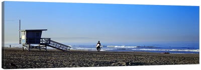 Rear view of a surfer on the beach, Santa Monica, Los Angeles County, California, USA Canvas Art Print - Los Angeles Art