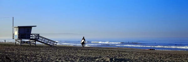 Santa Monica: Rear view of a surfer on the beach, Santa Monica, Los Angeles County, California, USA by Panoramic Images