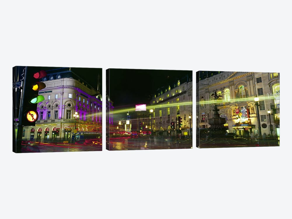 Blurred Motion View Of Nighttime Lights, Piccadilly Circus, London, England by Panoramic Images 3-piece Canvas Print