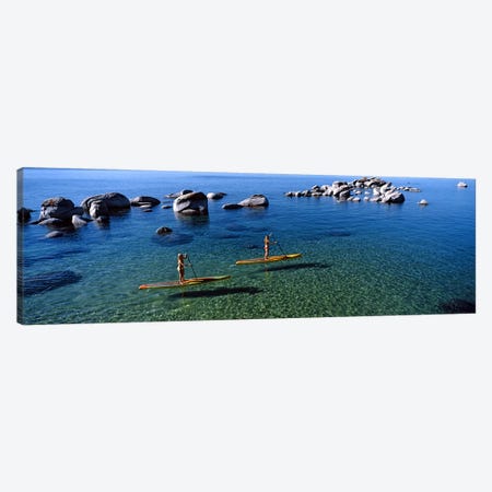 Two women paddle boarding in a lake, Lake Tahoe, California, USA Canvas Print #PIM8846} by Panoramic Images Canvas Art