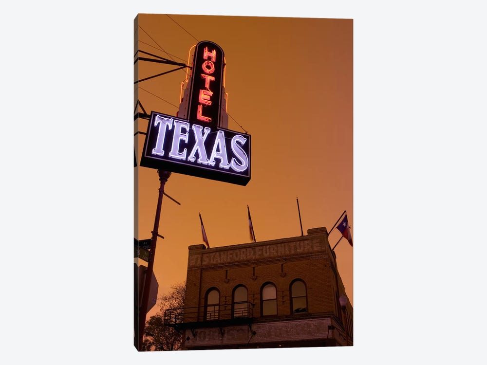 Low angle view of a neon sign of a hotel lit up at dusk, Fort Worth Stockyards, Fort Worth, Texas, USA 1-piece Canvas Art