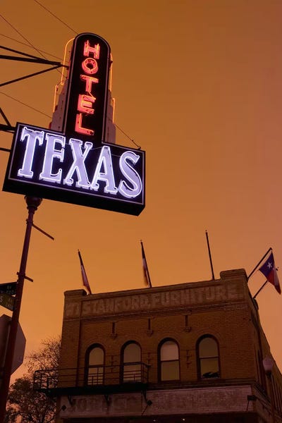 Fort Worth: Low angle view of a neon sign of a hotel lit up at dusk, Fort Worth Stockyards, Fort Worth, Texas, USA by Panoramic Images