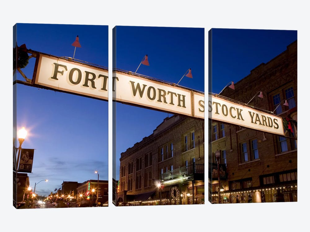 Signboard over a road at dusk, Fort Worth Stockyards, Fort Worth, Texas, USA by Panoramic Images 3-piece Canvas Wall Art