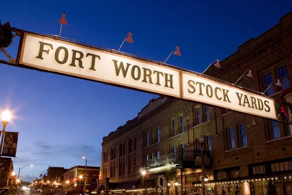 Fort Worth: Signboard over a road at dusk, Fort Worth Stockyards, Fort Worth, Texas, USA by Panoramic Images