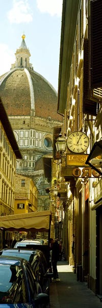 Tuscany: Cars parked in a street with a cathedral in the background, Via Dei Servi, Duomo Santa Maria Del Fiore, Florence, Tuscany, Italy by Panoramic Images