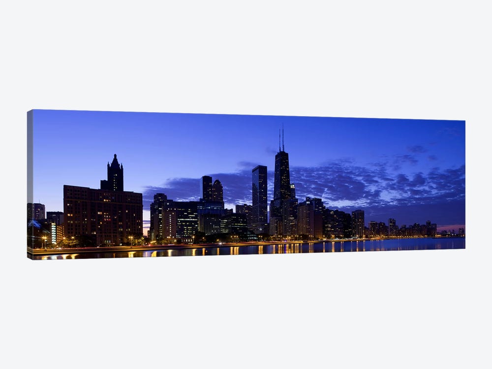 Lit up buildings at the waterfront, Lake Michigan, Chicago, Cook County, Illinois, USA 2010 by Panoramic Images 1-piece Art Print