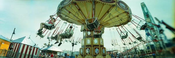 Brooklyn: Tourists riding on an amusement park ride, Lynn's Trapeze, Luna Park, Coney Island, Brooklyn, New York City, New York State, USA by Panoramic Images