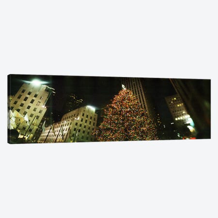 Christmas tree lit up at night, Rockefeller Center, Manhattan, New York City, New York State, USA Canvas Print #PIM8983} by Panoramic Images Canvas Art