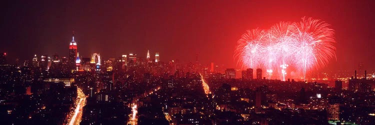 Fireworks display at night over a city, New York City, New York State, USA