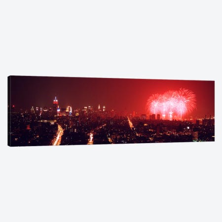 Fireworks display at night over a city, New York City, New York State, USA Canvas Print #PIM9002} by Panoramic Images Canvas Art