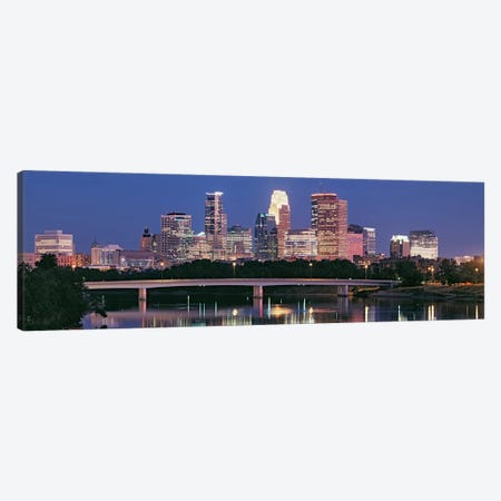 Buildings lit up at night in a city, Minneapolis, Mississippi River, Hennepin County, Minnesota, USA Canvas Print #PIM9015} by Panoramic Images Canvas Wall Art