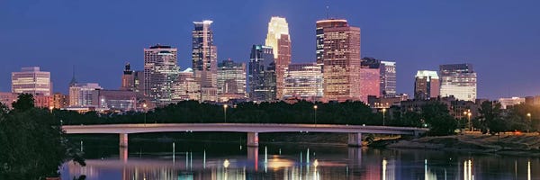 Minnesota: Buildings lit up at night in a city, Minneapolis, Mississippi River, Hennepin County, Minnesota, USA by Panoramic Images