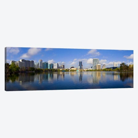 Reflection of buildings in a lake, Lake Eola, Orlando, Orange County, Florida, USA 2010 Canvas Print #PIM9020} by Panoramic Images Canvas Artwork