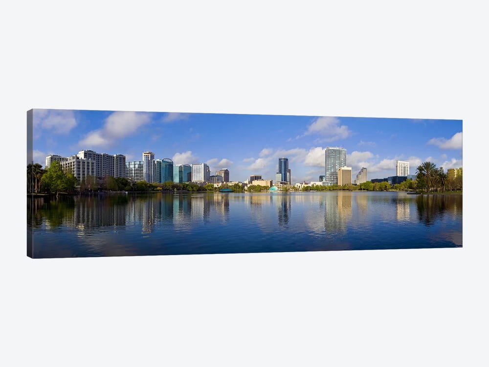 Reflection of buildings in a lake, Lake Eola, Orlando, Orange County, Florida, USA 2010 by Panoramic Images 1-piece Canvas Art Print