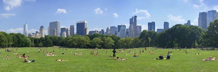 Tourists resting in a parkSheep Meadow, Central Park, Manhattan, New York City, New York State, USA